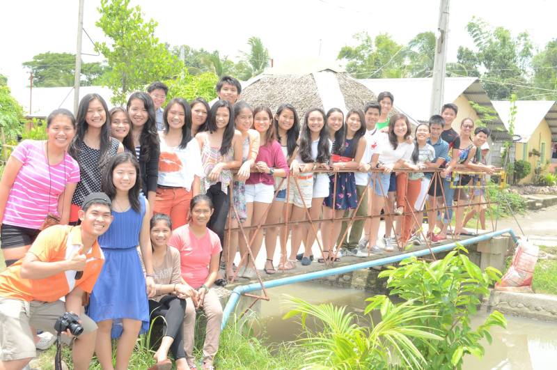 BM members and the GK Youth on the bridgeway to GK Site- Banago